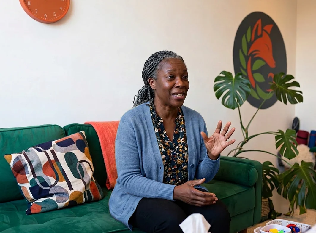 Female client on the sofa talking to a therapist Female client on the sofa talking to a therapist